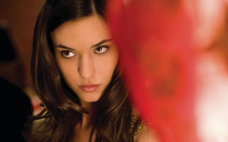 woman with brown hair looking