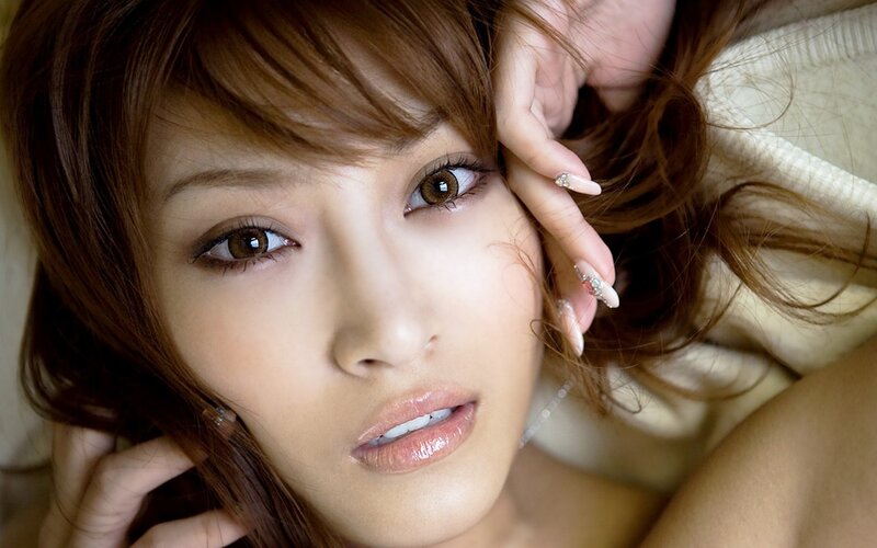 woman with brown hair lying down
