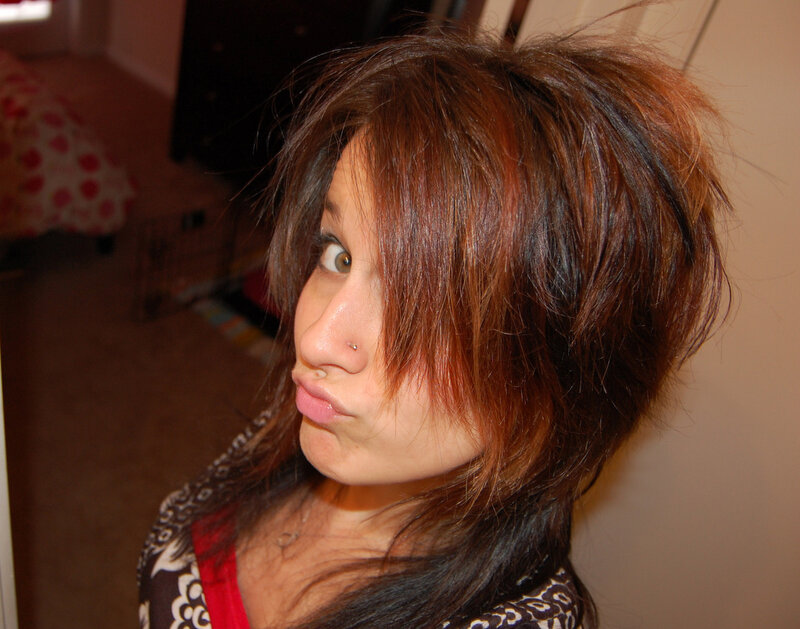 woman with brown hair making a face