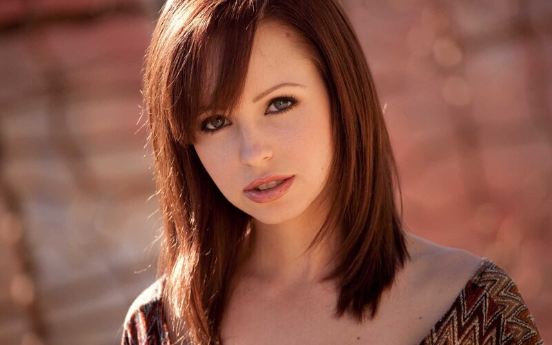 Woman with Brown Hair — Neutral, Afternoon, Photograph, Bricks