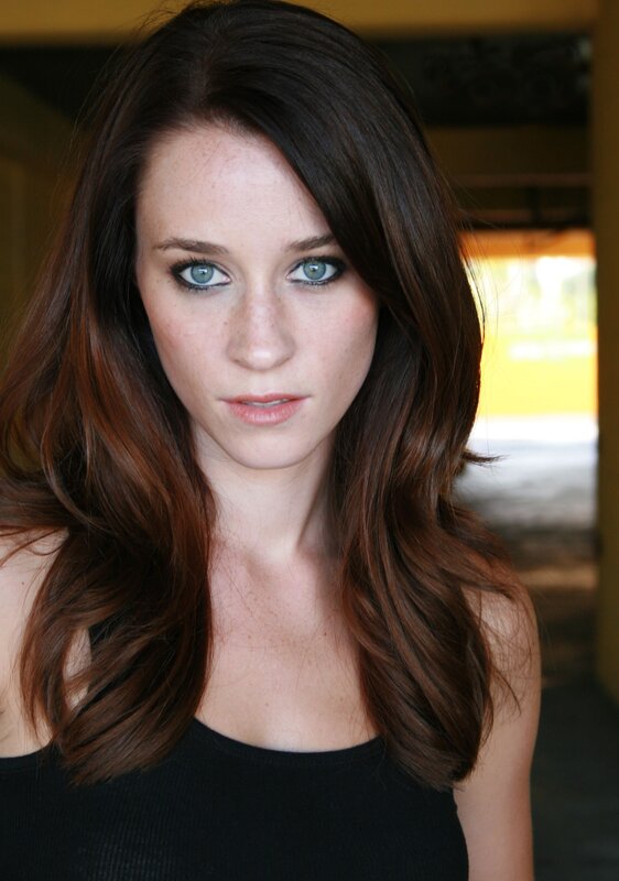 Woman with Brown Hair — Neutral, Photograph, Black Top, Blue