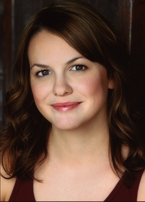Woman with Brown Hair — Neutral, Photograph, Brown Hair, Maroon Top, Dark Background