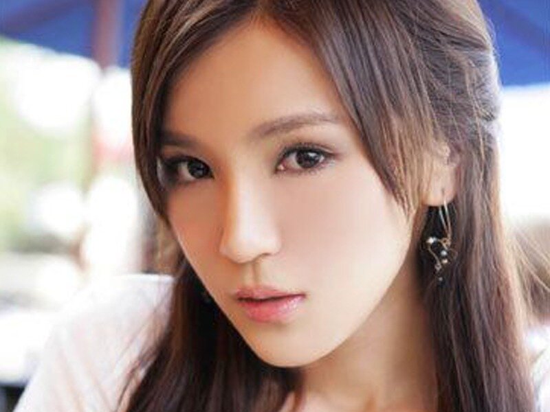 Woman with Brown Hair — Neutral, Photograph, Earring