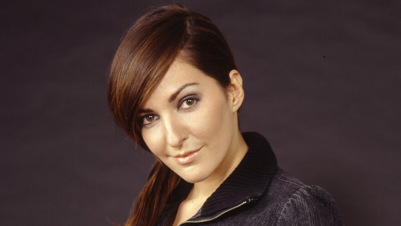 Woman with Brown Hair — Neutral, Photograph, Jacket, Dark Background
