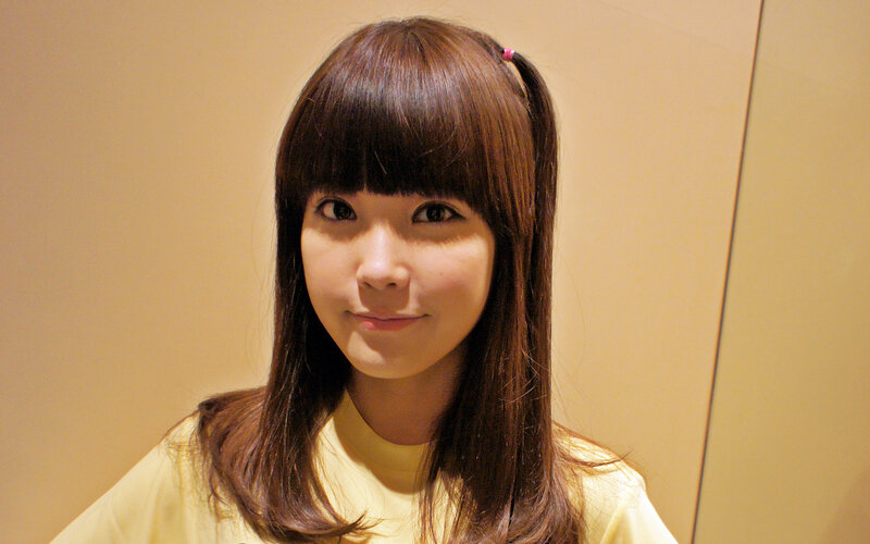 Woman with Brown Hair — Neutral, Photograph, Yellow Shirt, Hair Tie