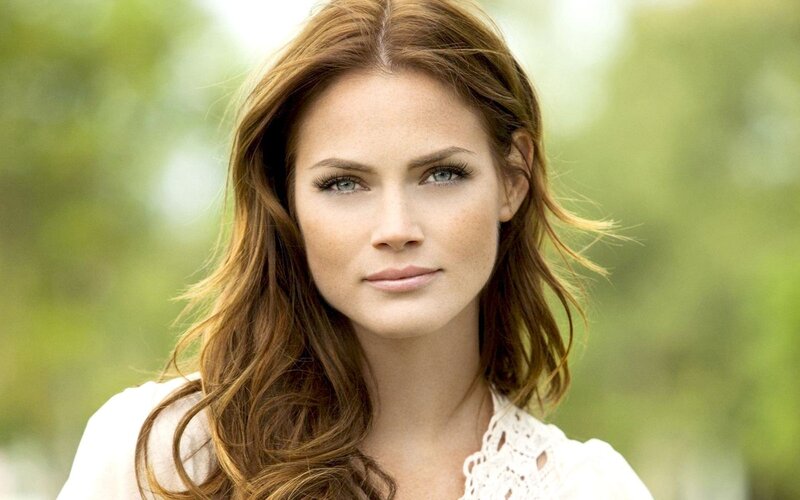 woman with brown hair outdoors
