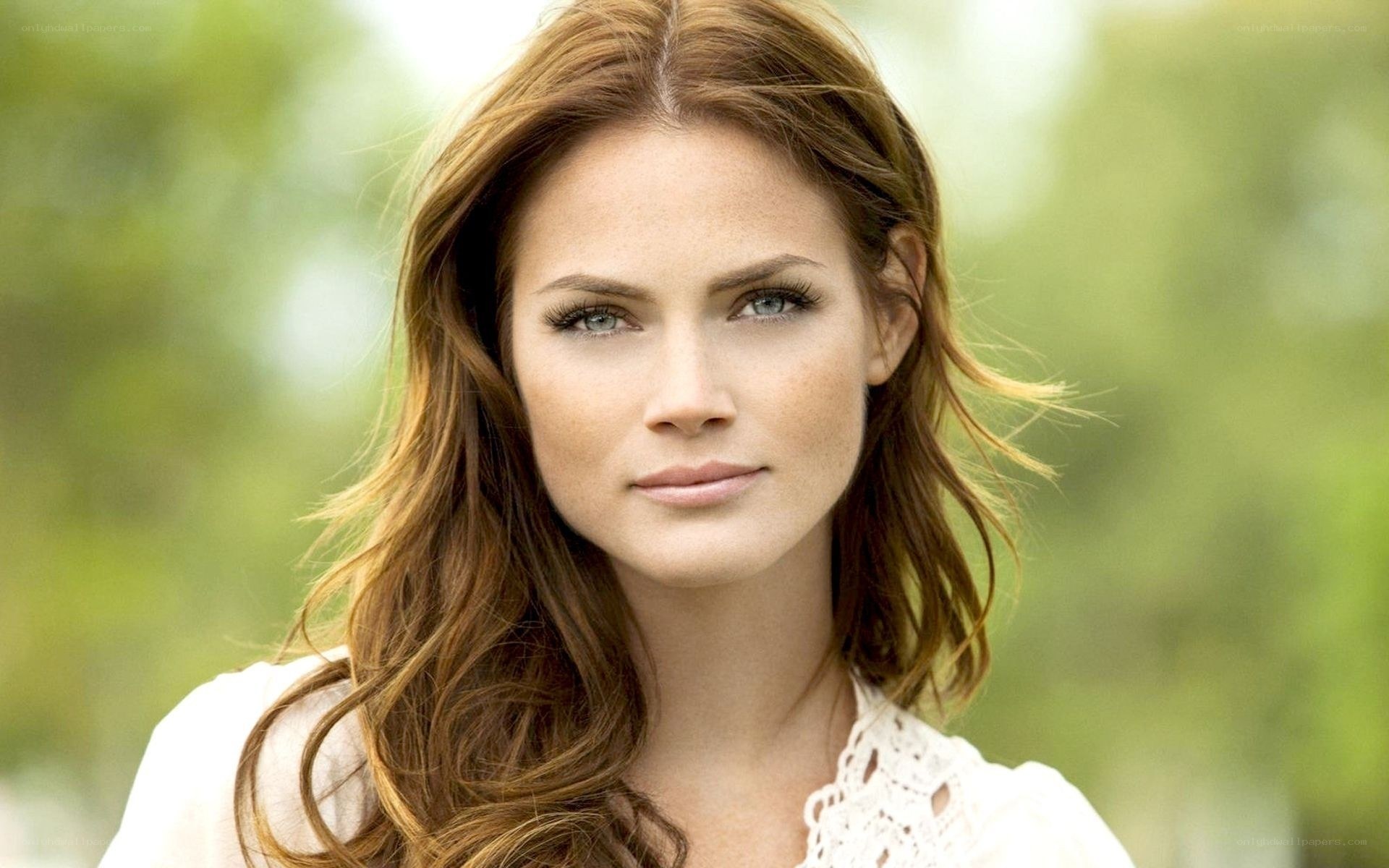 woman with brown hair outdoors