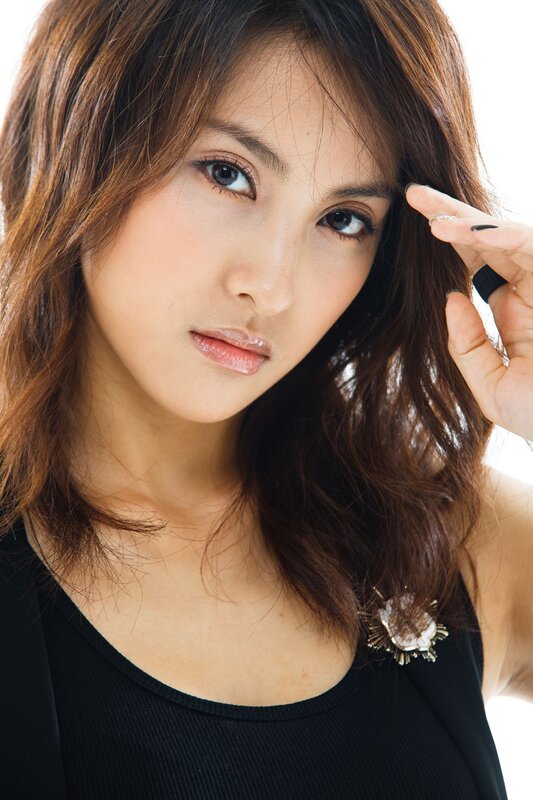 woman with brown hair posing