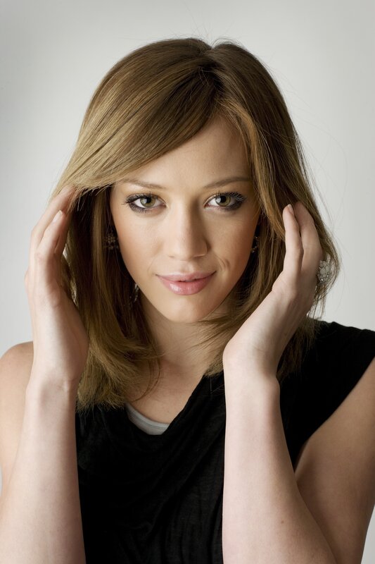 woman with brown hair posing