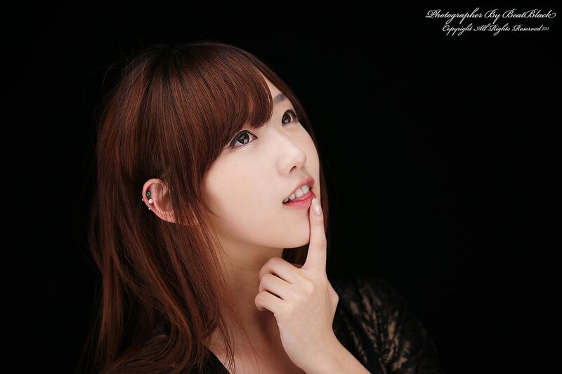 woman with brown hair posing