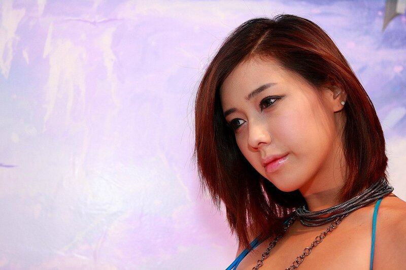 Woman with Brown Hair — Purple, Neutral, Photograph, Necklace, Blue Top
