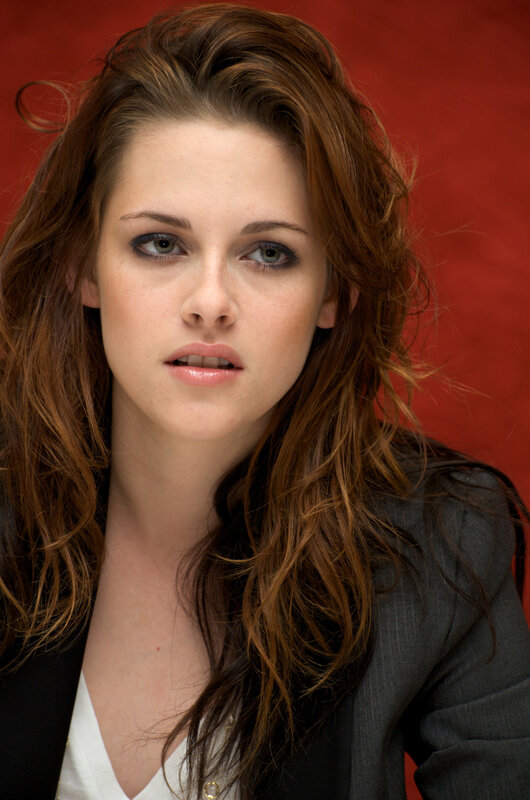 Woman with Brown Hair — Red, Serious, Photograph