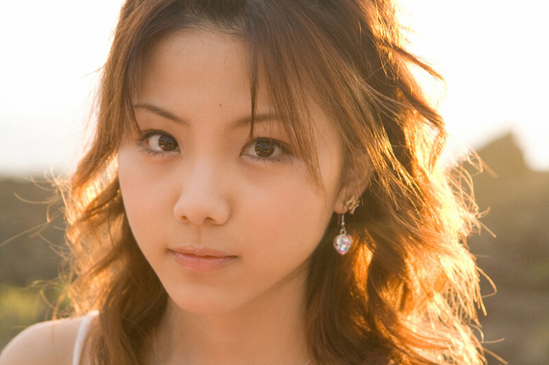 Woman with Brown Hair — Serene, Sunset, Photograph, Earring