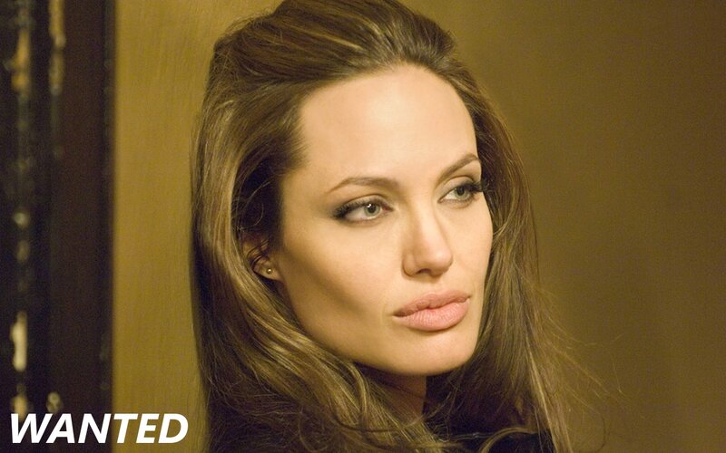 Woman with Brown Hair — Serious, Photograph, Earring, Wall