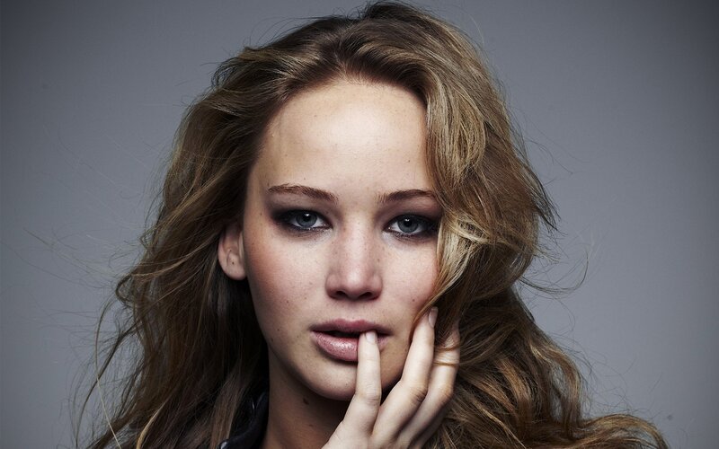 Woman with Brown Hair — Serious, Photograph, Hand, Makeup