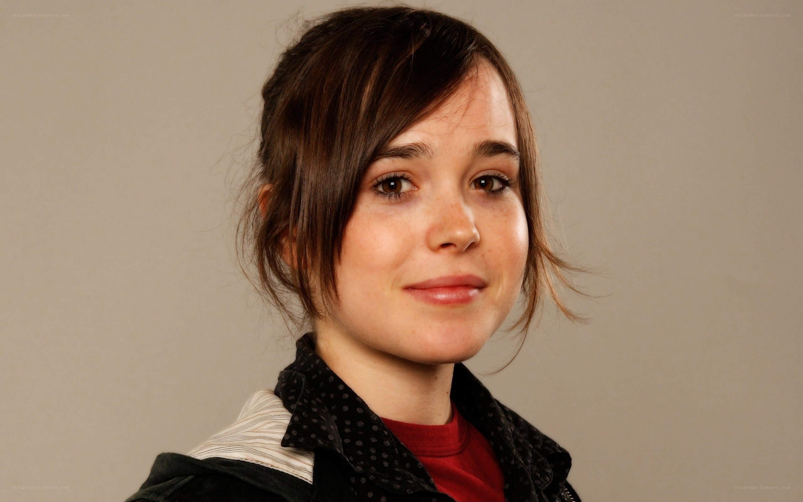 woman with brown hair smiling