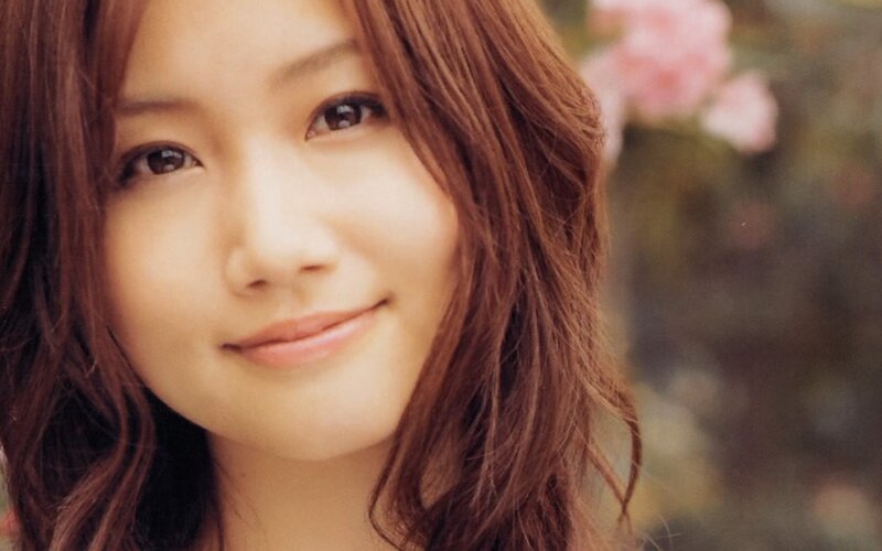woman with brown hair smiling
