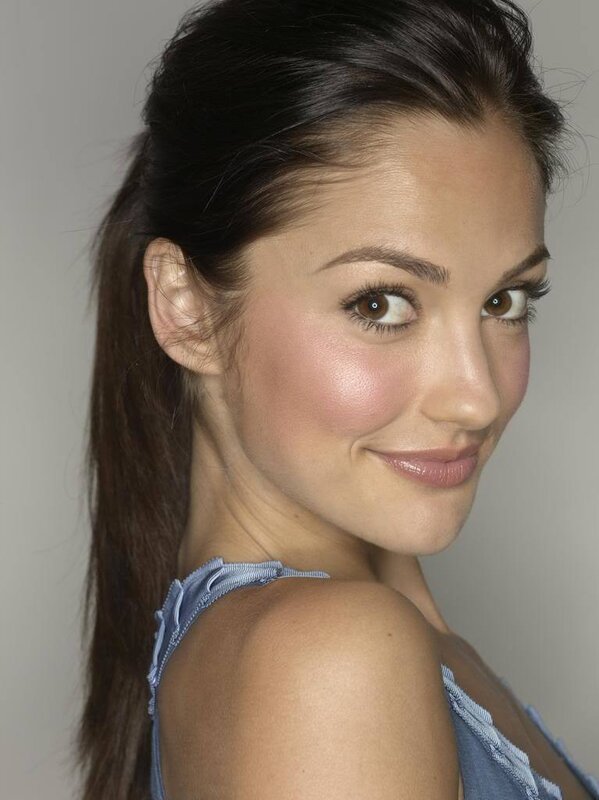woman with brown hair smiling