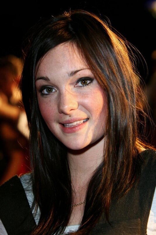woman with brown hair smiling