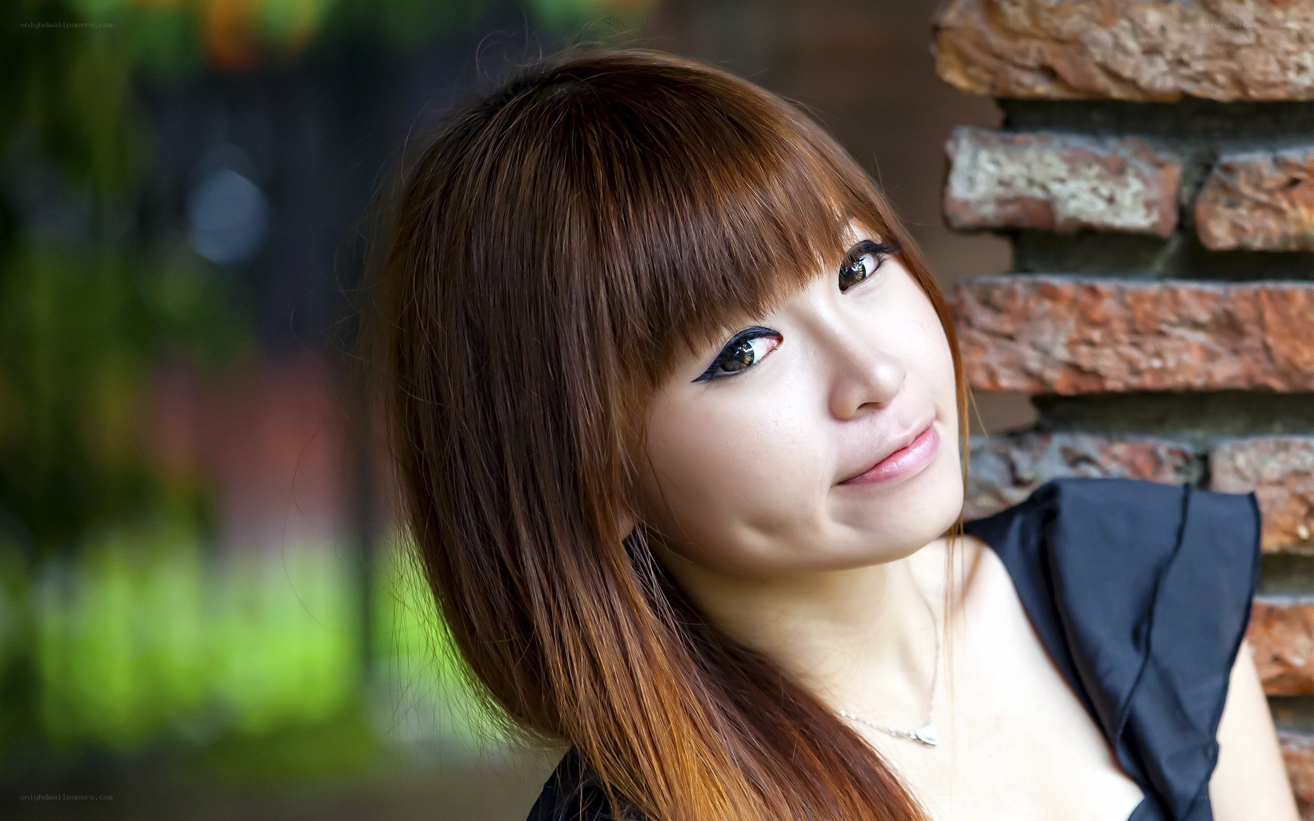 woman with brown hair smiling