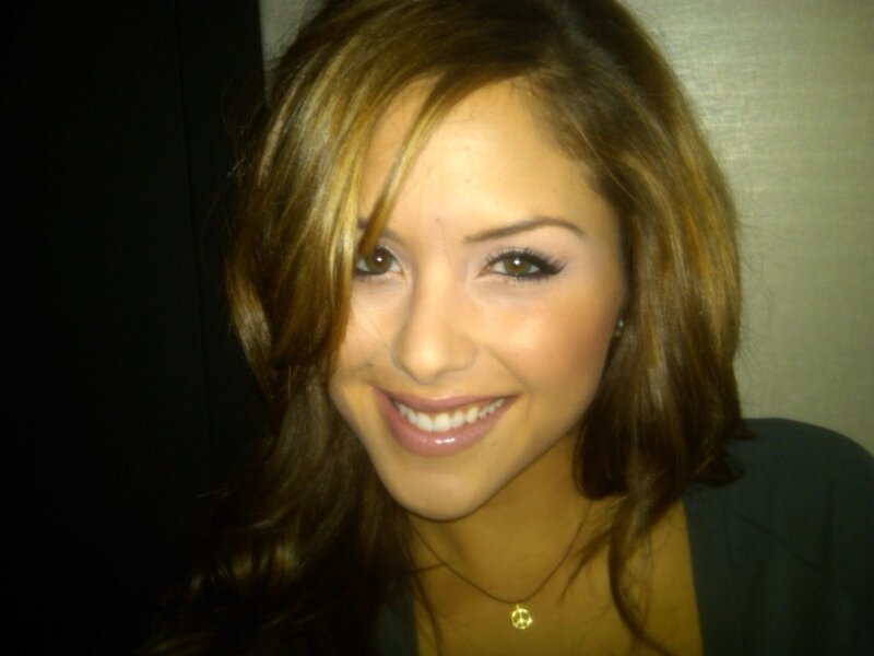 woman with brown hair smiling