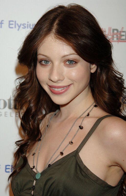 woman with brown hair smiling