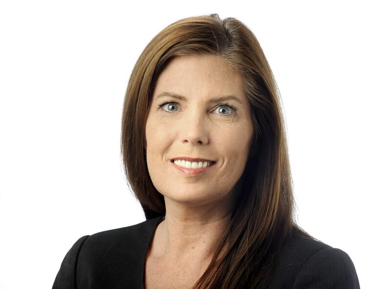 woman with brown hair smiling