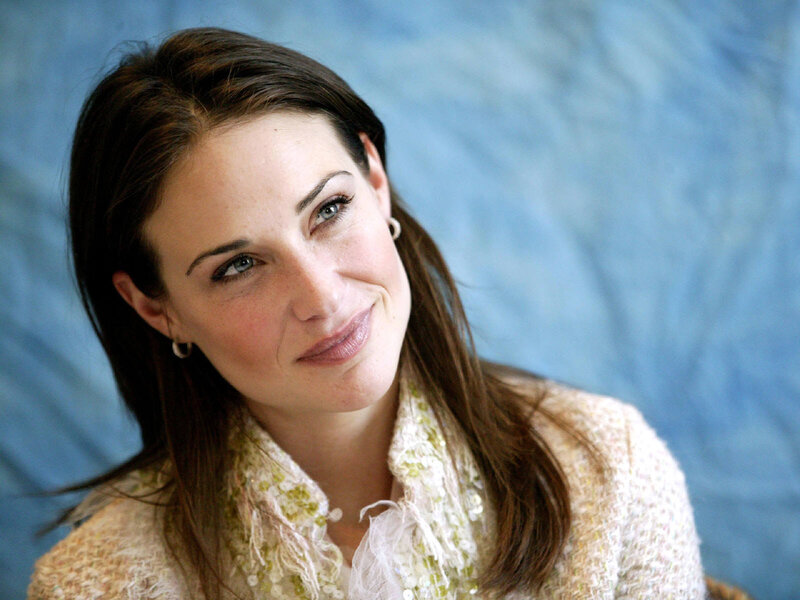 woman with brown hair smiling