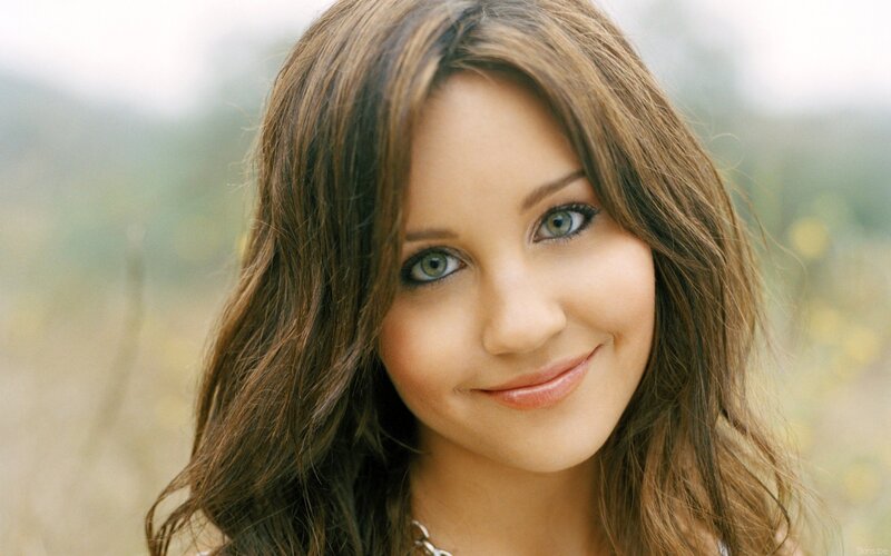 woman with brown hair smiling