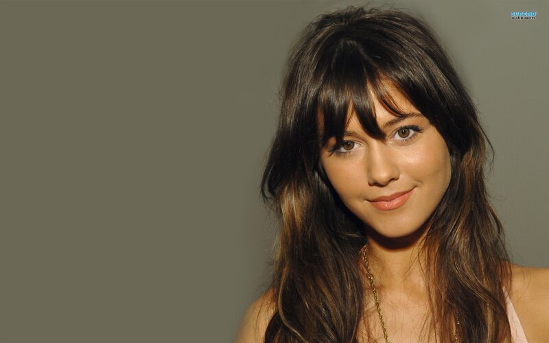 woman with brown hair smiling