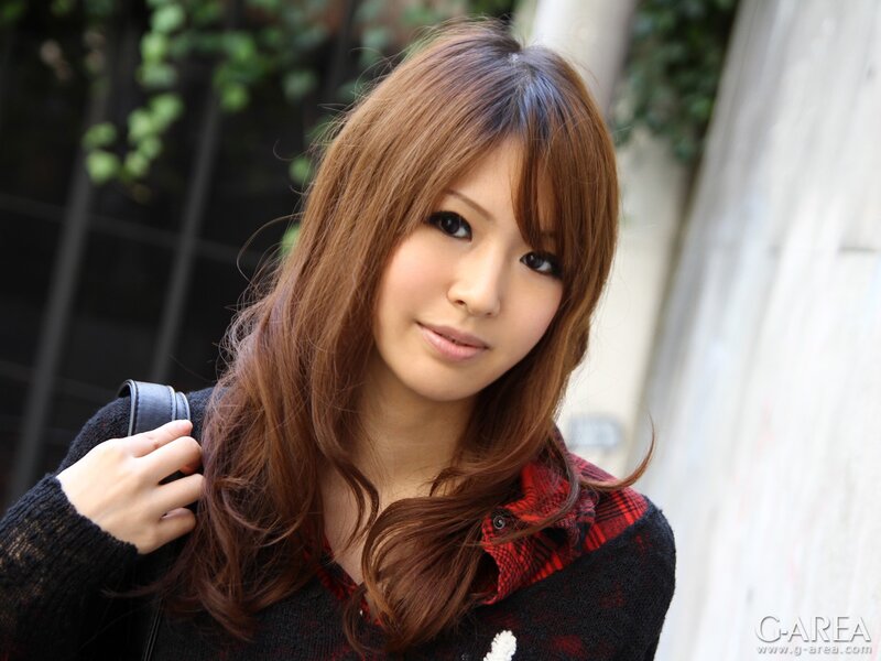 woman with brown hair smiling