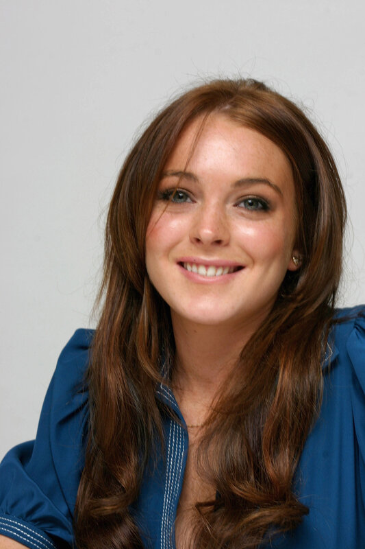woman with brown hair smiling