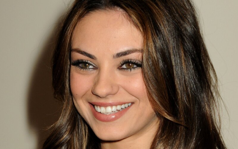 woman with brown hair smiling