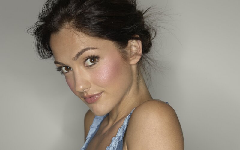 woman with brown hair smiling