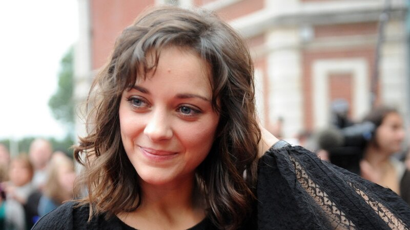 woman with brown hair smiling