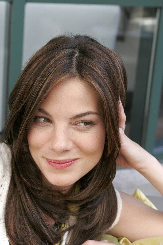 woman with brown hair smiling