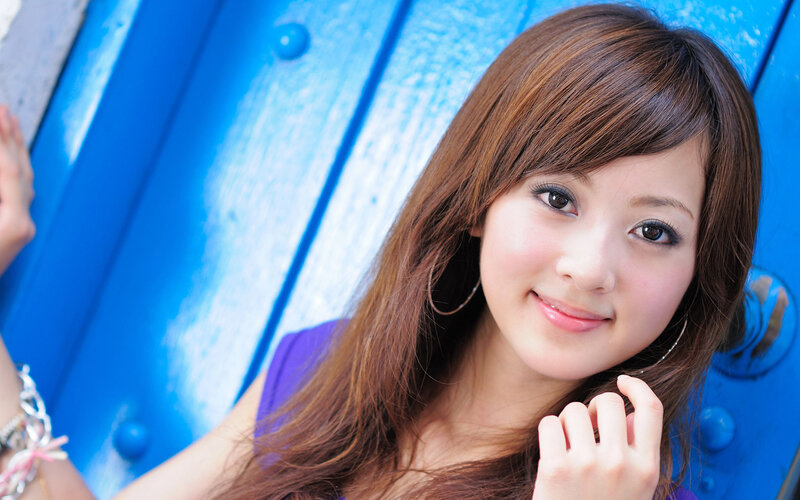 woman with brown hair smiling