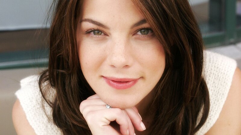 woman with brown hair smiling