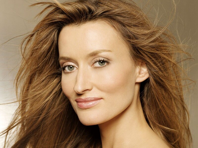 woman with brown hair smiling