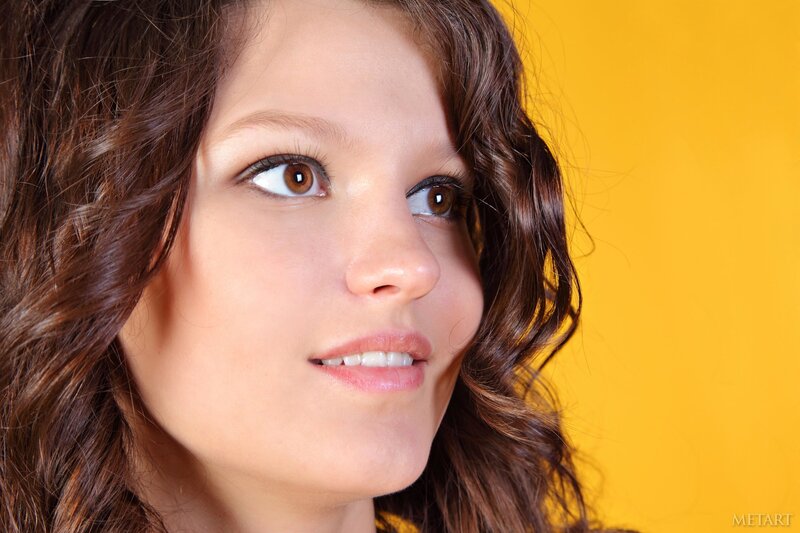 woman with brown hair smiling