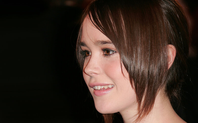 woman with brown hair smiling