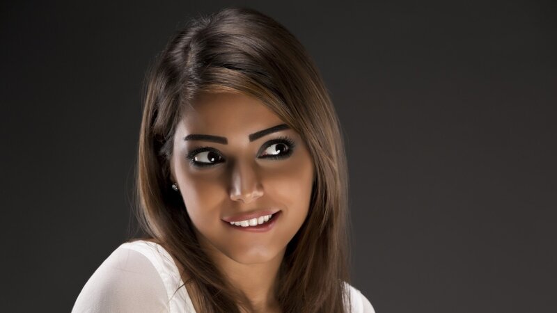 woman with brown hair smiling