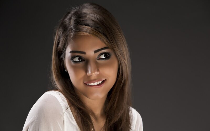 woman with brown hair smiling