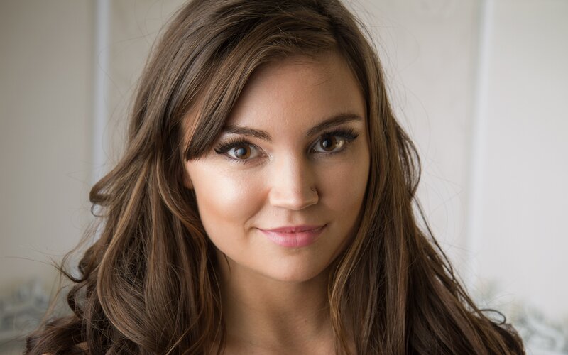 woman with brown hair smiling