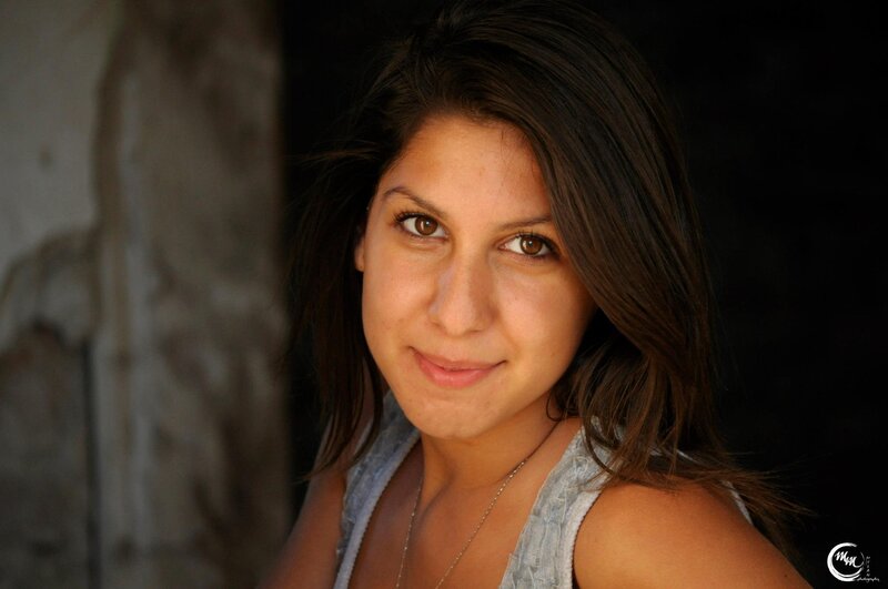 woman with brown hair smiling