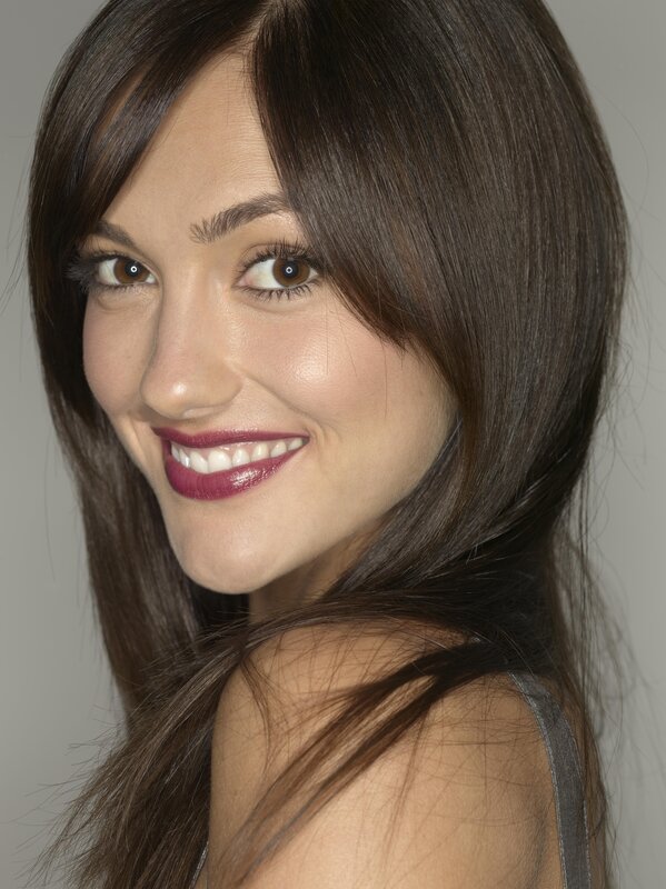 woman with brown hair smiling