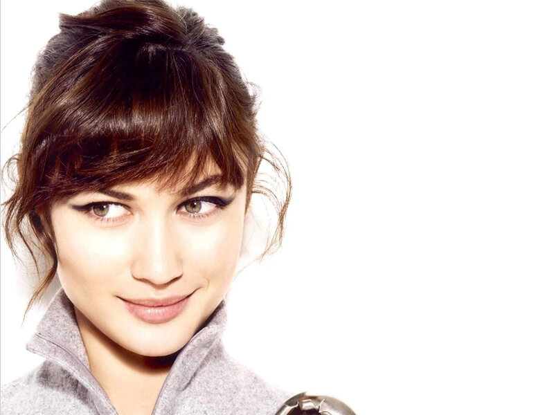 woman with brown hair smiling