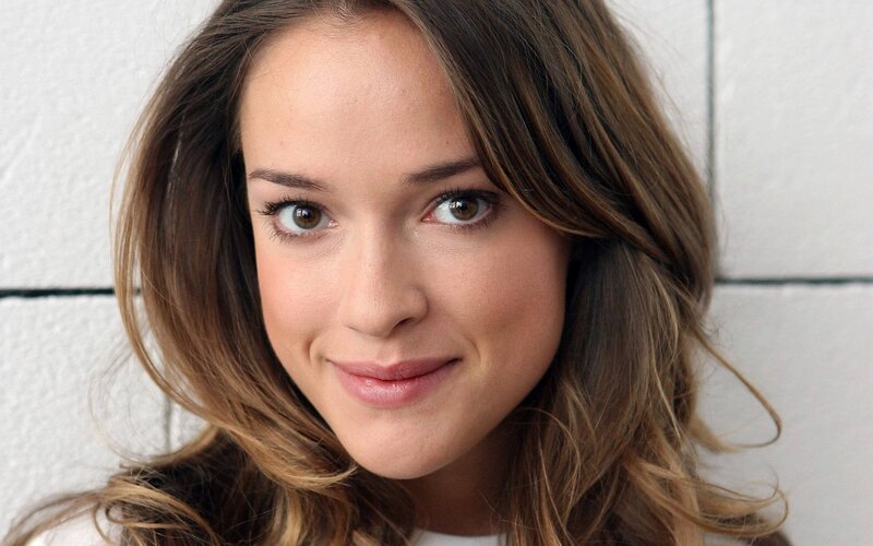 woman with brown hair smiling