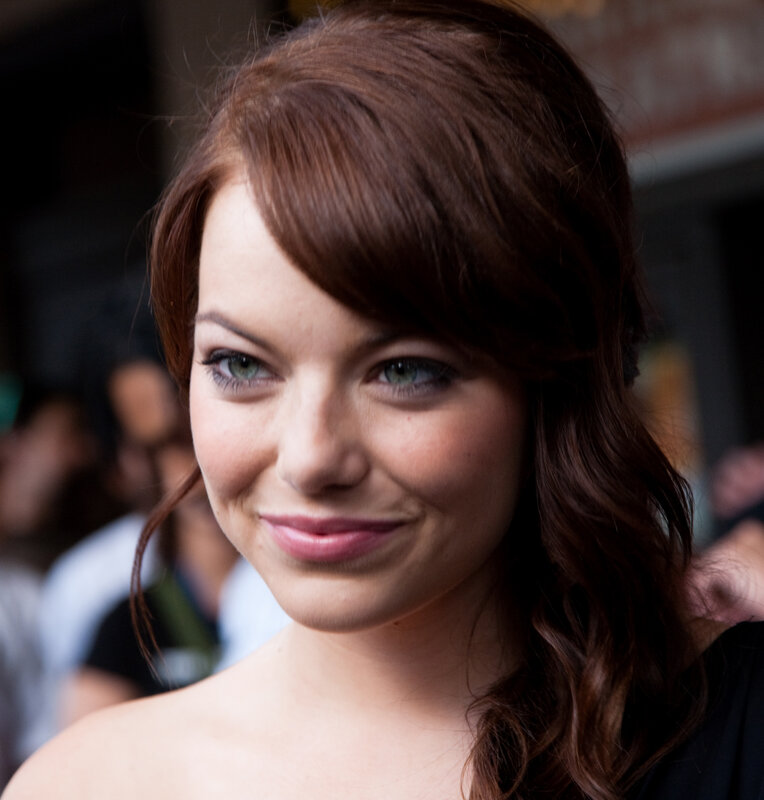 woman with brown hair smiling