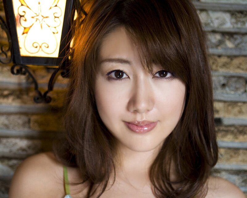 woman with brown hair smiling
